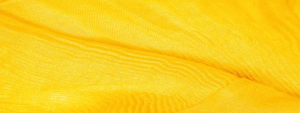 Textura, pozadí, vzorek, rozdrcené žluté hedvábné korugace — Stock fotografie