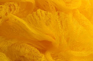 Doku arka planı, desen. Örgü sarı kumaş. Accen için ideal