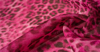 Arka plan dokusu. leopar ipek parlak kumaş afrika temaları