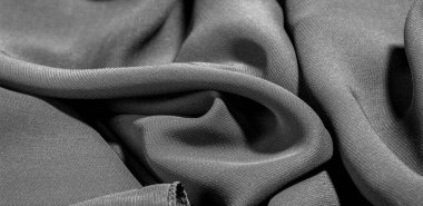 İpek kumaş Arka plan dokusu. Bu doğal siyah bir atkı.