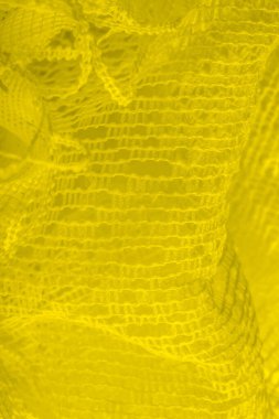 Doku, arka plan, desen. sarı tül. Basit bir tasarıma sahip