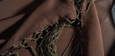 İpek kumaş Arka plan dokusu. Bu doğal kahverengi bir atkı.