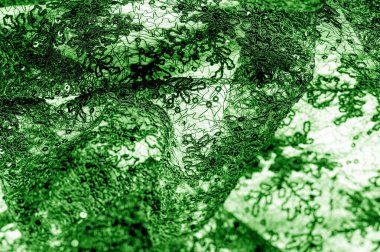 Doku, desen, beyaz bir arka plan üzerinde yeşil dantel kumaş. Th