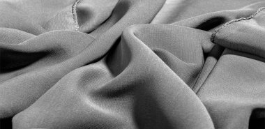 İpek kumaş Arka plan dokusu. Bu doğal siyah bir atkı.