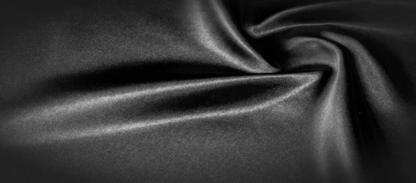 Texture, sfondo, motivo. Tessuto di seta nera. È nero e — Foto Stock