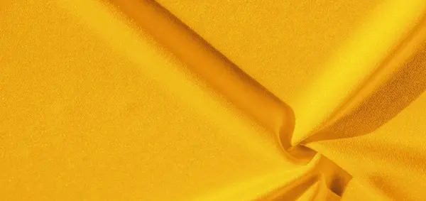 Tekstur, baggrund, silke stof, gul kvindes lommetørklæde; D - Stock-foto