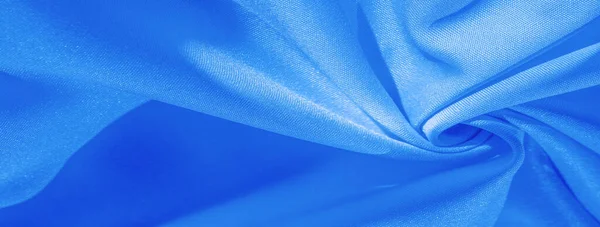 Textuur, achtergrond, patroon, effen licht blauwe zijde satijn stof — Stockfoto