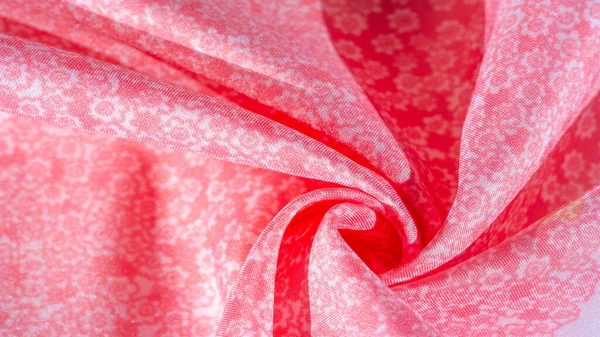 Текстура, фон, узор, розовая шелковая ткань на белом фоне — стоковое фото
