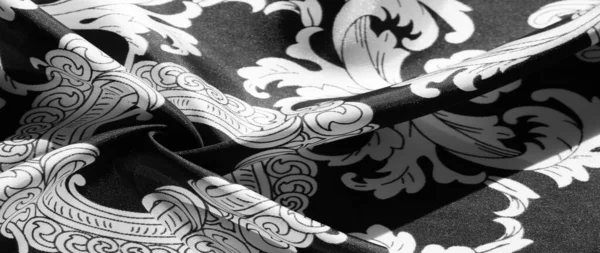 Textură, fundal, țesătură de mătase neagră cu un model monogram E — Fotografie, imagine de stoc