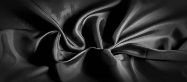 Texture, sfondo, motivo. Tessuto di seta nera. È nero e — Foto Stock