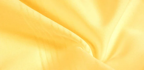 Texture background, pattern. silk yellow fabric. From Telio, thi — Stock Photo, Image