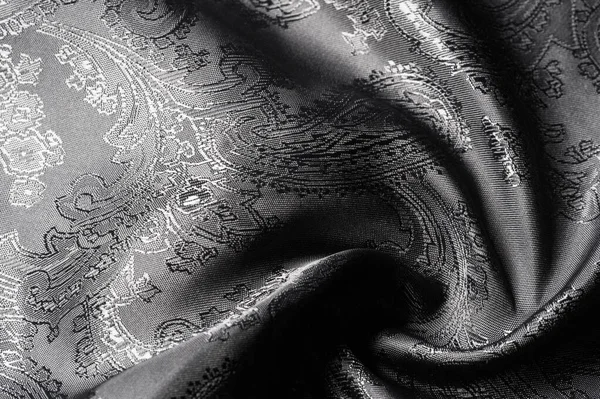 Texture, background, black steel gray fabric with a paisley patt — Stock Photo, Image