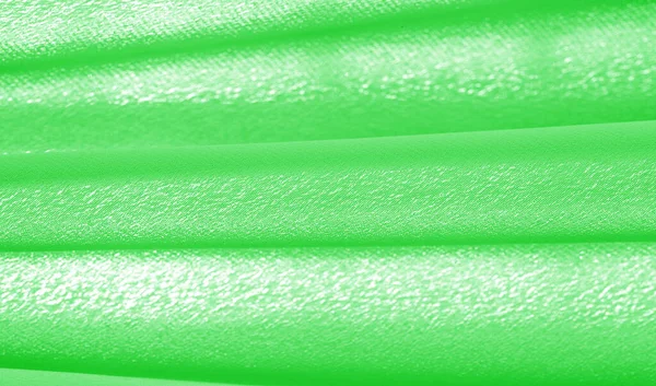 Una foto. Textura, fondo. Tela de seda verde esmeralda. Este yo. — Foto de Stock