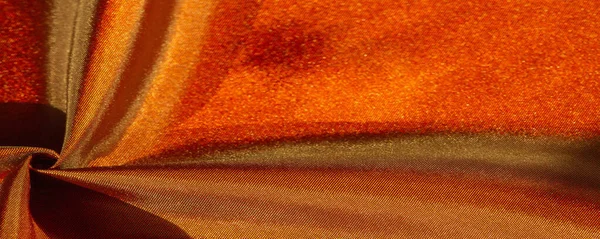 Tekstura tła pocztówki, tkanina jedwabna od brązowego do Złotego — Zdjęcie stockowe