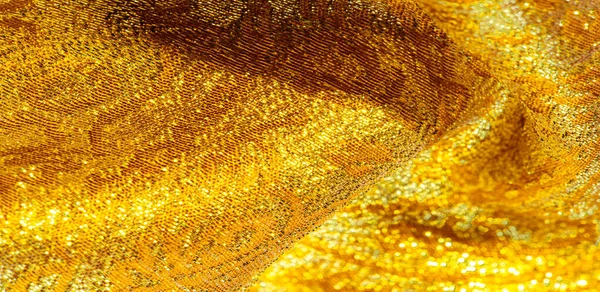 Texture background, pattern. fabric; yellow gold brocade. Organz — Stock Photo, Image