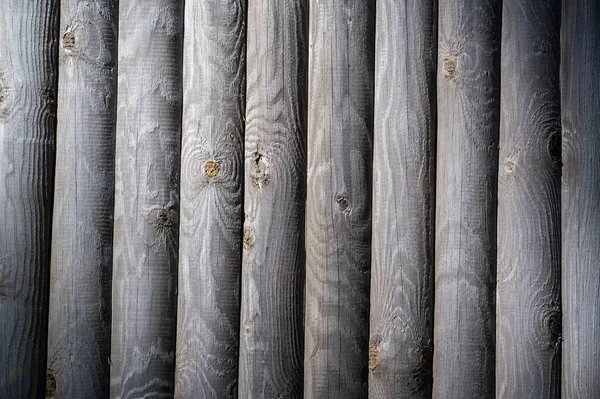 Tekstura, tło, wzór. Ogrodzenia z drewnianych prętów, niemalowane, — Zdjęcie stockowe