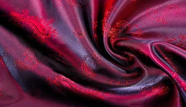 Texture, fabric, red silk with paisley pattern. This beautiful p