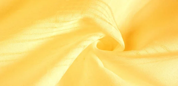 texture background, pattern. silk yellow fabric. From Telio, thi