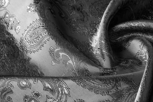 Texture, fond, tissu gris acier noir avec une patte paisley — Photo