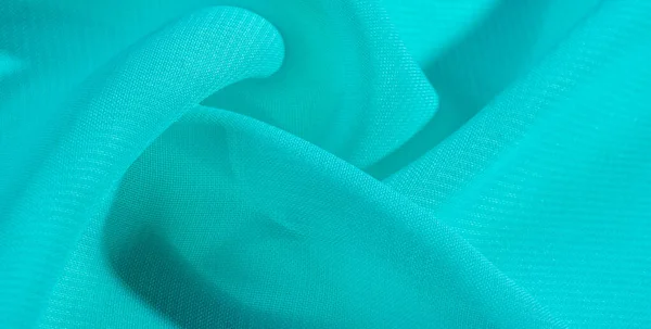 Vzorek pozadí textury modrá hedvábná tkanina. ten hedvábný organzy — Stock fotografie