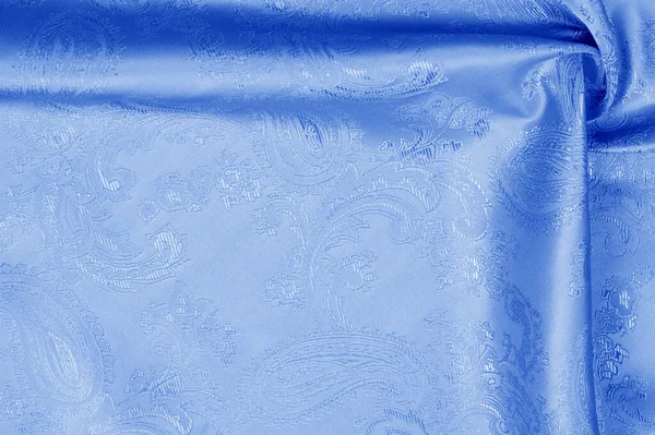 Tekstura, tło, wzór. Tkanina jest jedwabna niebieska. Luksus w — Zdjęcie stockowe