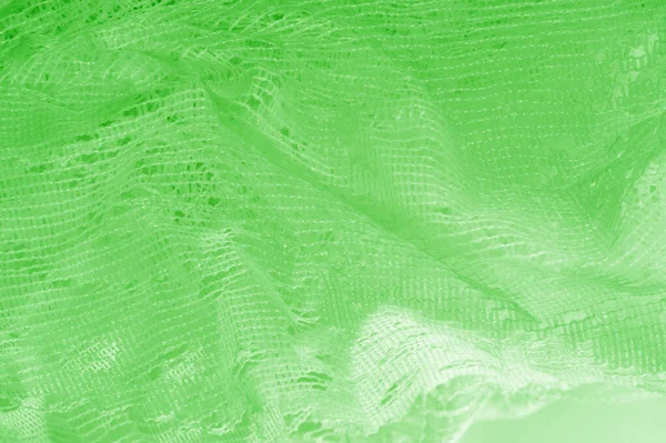 Textura, fundo, padrão. tule verde. Fino com um w mais pesado — Fotografia de Stock