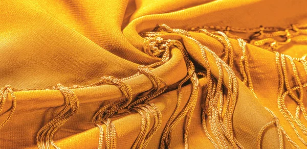 Background texture of silk fabric. This is a natural yellow scar