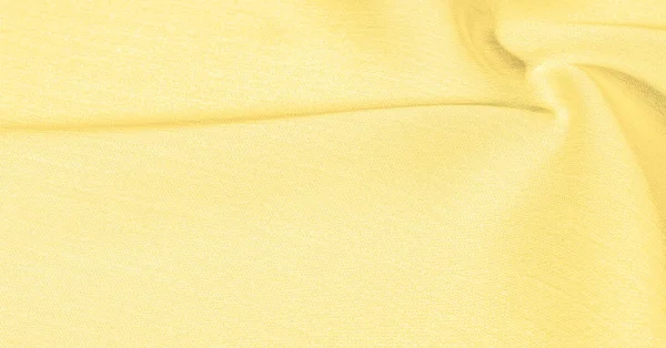 Background, pattern, texture, wallpaper, yellow silk fabric. It — Stock Photo, Image