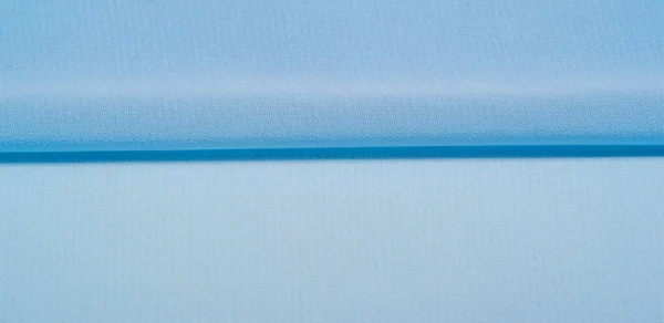 Wzór tła tekstury. Niebieska tkanina jedwabna jest to lekka sztuka — Zdjęcie stockowe