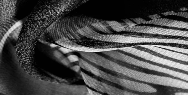 Textur, Hintergrund, Muster, Tapete. schwarz weißer Seidenstoff — Stockfoto