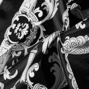 doku, arka plan, monogram desenli siyah ipek kumaş E