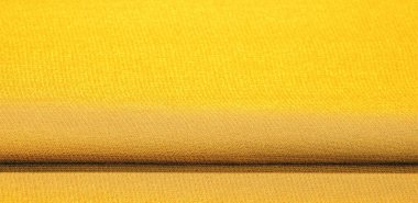 İpek kumaş Arka plan dokusu. Bu doğal sarı bir yara izi.