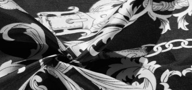 doku, arka plan, monogram desenli siyah ipek kumaş E