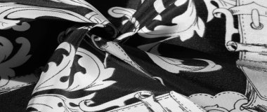 doku, arka plan, monogram desenli siyah ipek kumaş E