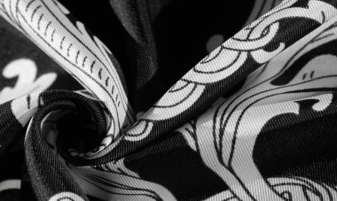 doku, arka plan, monogram desenli siyah ipek kumaş E