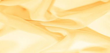 doku arka plan deseni. Ince bir paspas ile sarı ipek kumaş