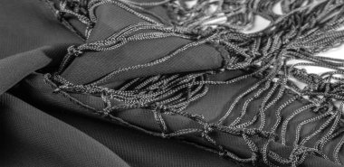 İpek kumaş Arka plan dokusu. Bu doğal siyah bir atkı.