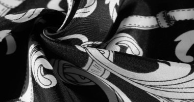 doku, arka plan, monogram desenli siyah ipek kumaş E
