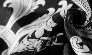 doku, arka plan, monogram desenli siyah ipek kumaş E