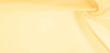 doku arka plan deseni. Ince bir paspas ile sarı ipek kumaş