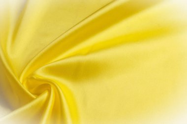 Doku arka plan deseni. İpek kumaş, sarı kumaş. Bir bla