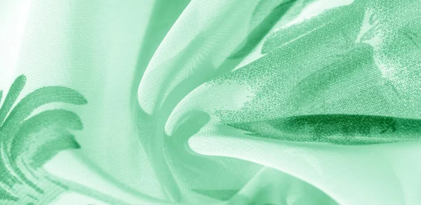 Texture background, pattern, wallpaper. white silk fabric, green