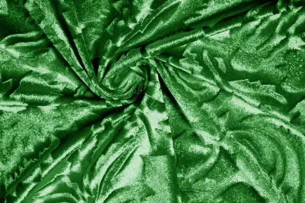 Velours groene stof fluweel patroon gesneden uit onder een uncircumc — Stockfoto