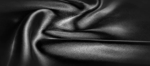 テクスチャ、背景、パターン。黒いシルク生地。それは黒で、 — ストック写真