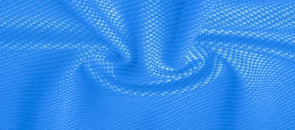 Tekstura tła, wzór tkanina ciepła wełna z haftem niebieskim — Zdjęcie stockowe