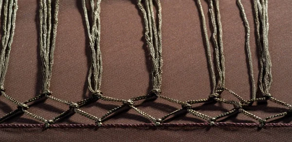 Textura de fondo de tela de seda. Esta es una bufanda marrón natural —  Fotos de Stock