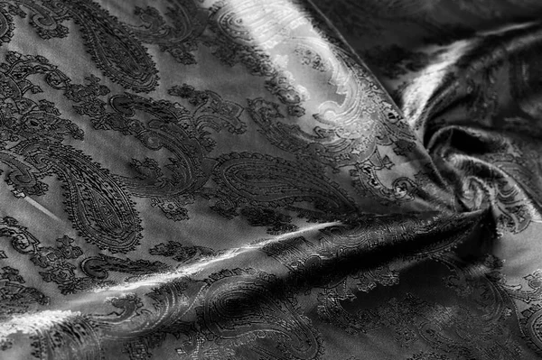 Texture, fond, tissu gris acier noir avec une patte paisley — Photo