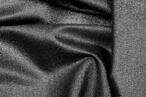 Texture, sfondo, pattern. Tessuto grigio nero rivestito con un met — Foto Stock