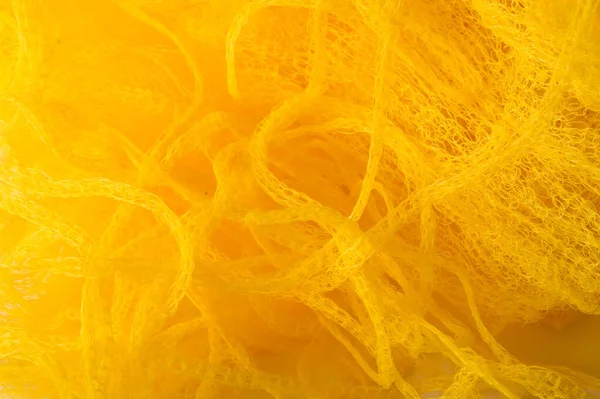 Textura de fondo, patrón. Malla de tela amarilla. Ideal para acentuar — Foto de Stock