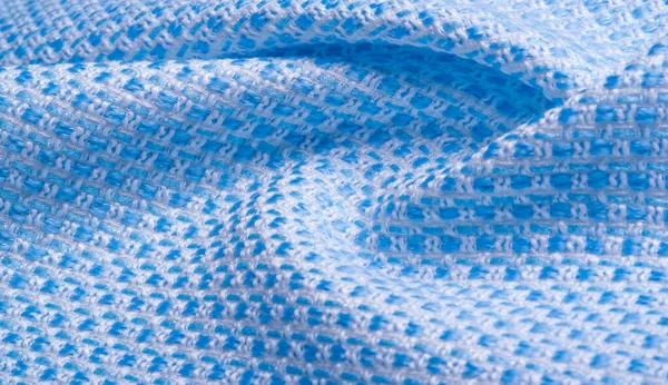 Texture, fabric, pattern. Large weave of blue and white threads,